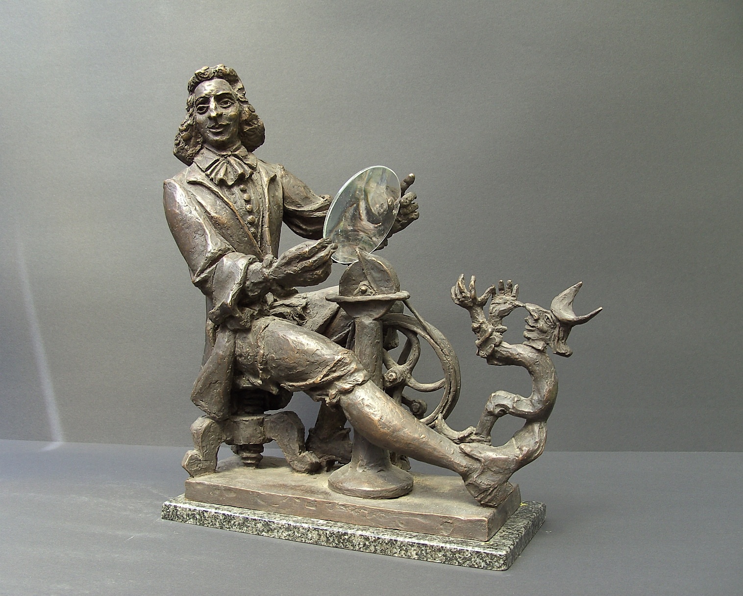Lens Polisher, Baruch and
        Benedict Spinoza,
        36 x 35 x 14,
        bronze, glass, 2002